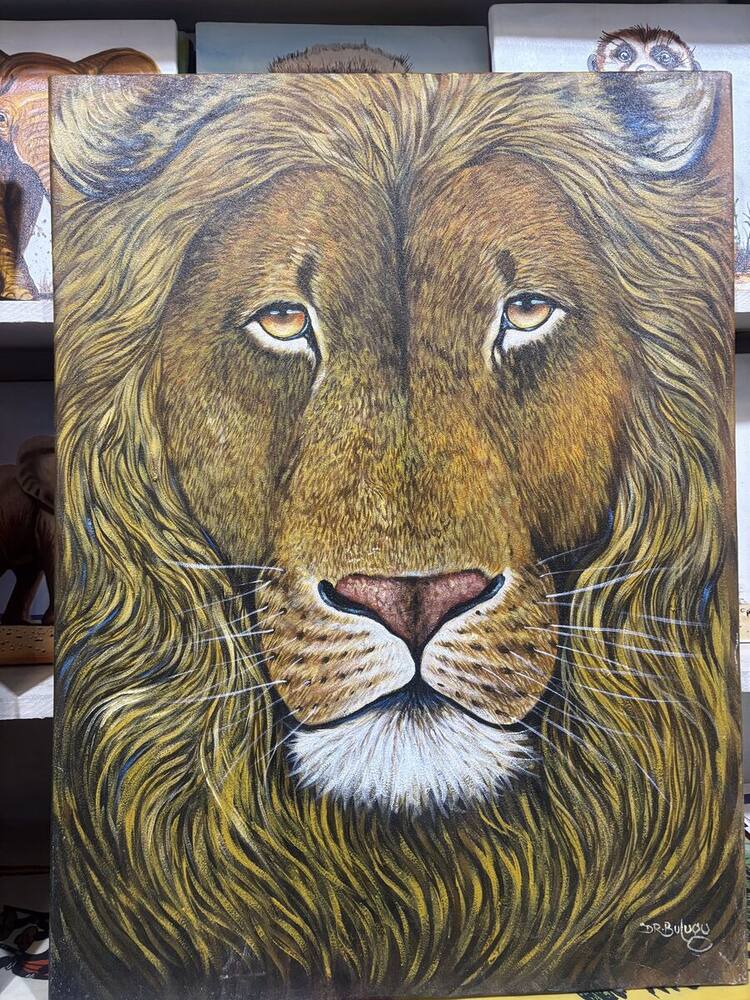 Golden lion face portrait, original Tanzanian painting