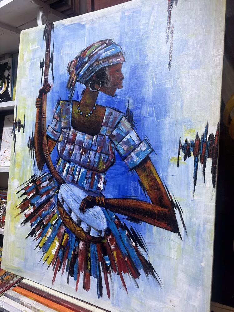 Woman in patterned dress and headwrap on blue, original Tanzanian painting