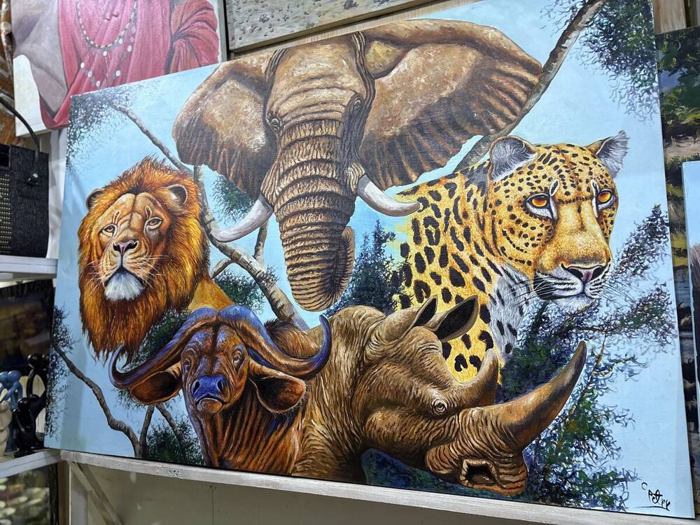 Big Five wildlife collage on blue, original Tanzanian painting