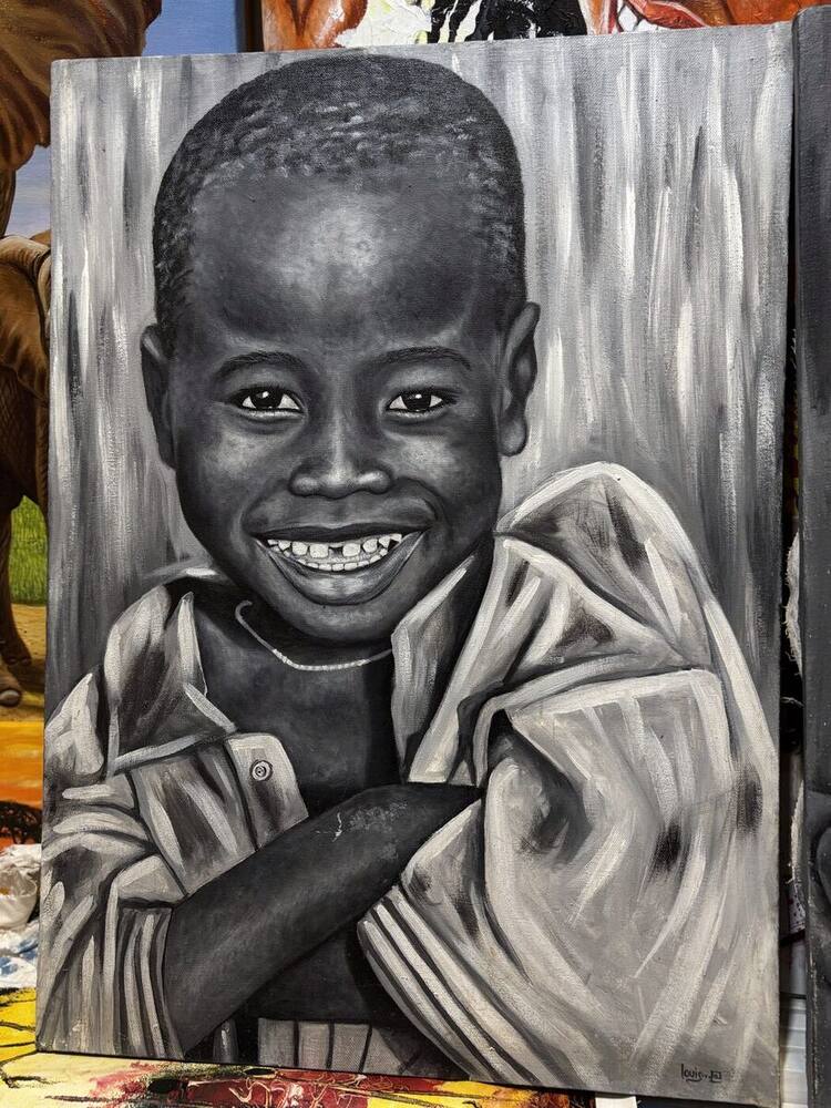 Black and white charcoal portrait of a smiling child by Tanzanian artist Louis
