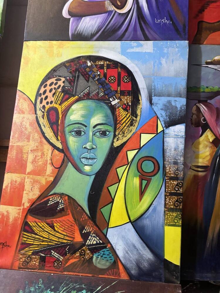 Cubist-style portrait of a woman with green face by Tanzanian artist Lugsha