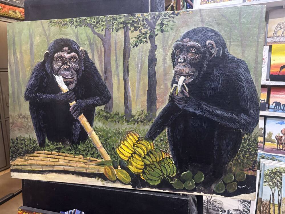 Two chimpanzees sharing bananas, painting by Tanzanian artist Mushi